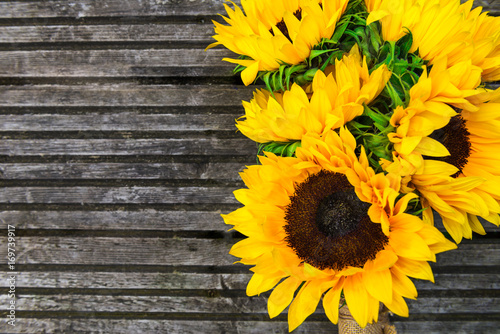 Fototapeta Naklejka Na Ścianę i Meble -  Yellow Sunflower Bouquet on Wooden Rustic Background