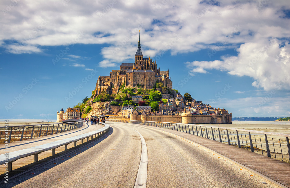 Obraz premium Saint Michael's Mount is an island commune in Normandy. The island has held strategic fortifications since ancient times and has been the seat of a monastery.