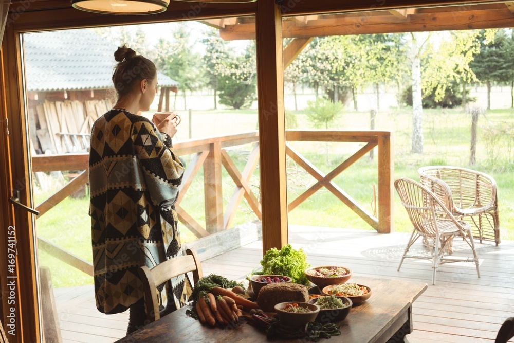 Woman having cup of coffee at home Woman having cup of coffee at home