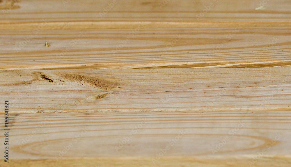 Naklejka premium Pine wood plank table surface from an angle