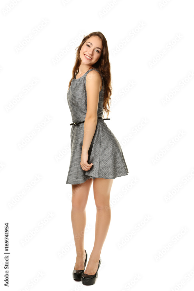 Portrait of young woman in dress on white background Portrait of young woman in dress on white background