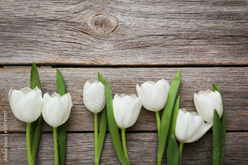 Fototapeta Naklejka Na Ścianę i Meble -  Bouquet of tulips on a grey wooden table