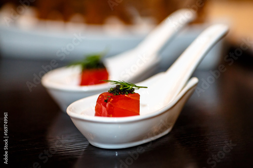 Cube raw tuna on a Japanese spoon for the soup was compliments of the chef