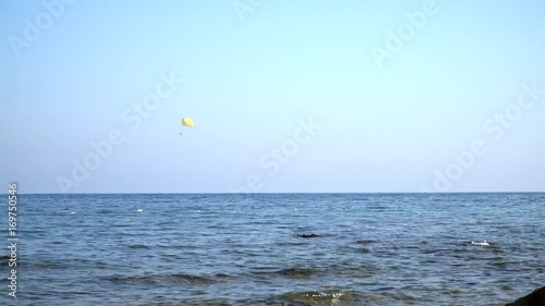 раrasailing over the sea photo