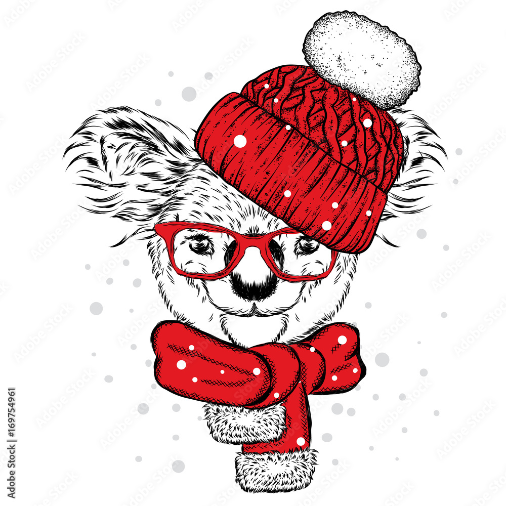 Obraz premium Fun koala in hat and scarf. Vector illustration for postcard or poster, print on clothes. New Year and Christmas, winter. Very cute cub.