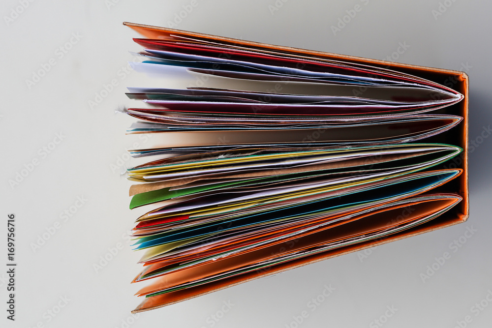 A colorful, handmade junk journal. Made from a recycled box and random paper such as book pages, envelopes and wall paper. Five signatures are stitched in with red thread. A colorful, handmade junk journal. Made from a recycled box and random paper such as book pages, envelopes and wall paper. Five signatures are stitched in with red thread.
