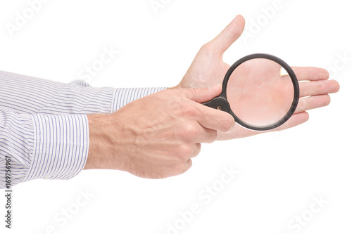 Male hands magnifying glass