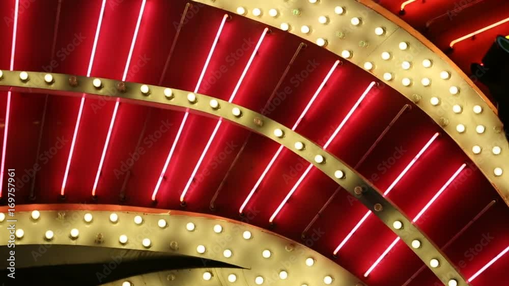 Red Neon Tube Lights and Bulbs Blink Detail. detail of a Las Vegas Casino neon lights and blinking bulbs
