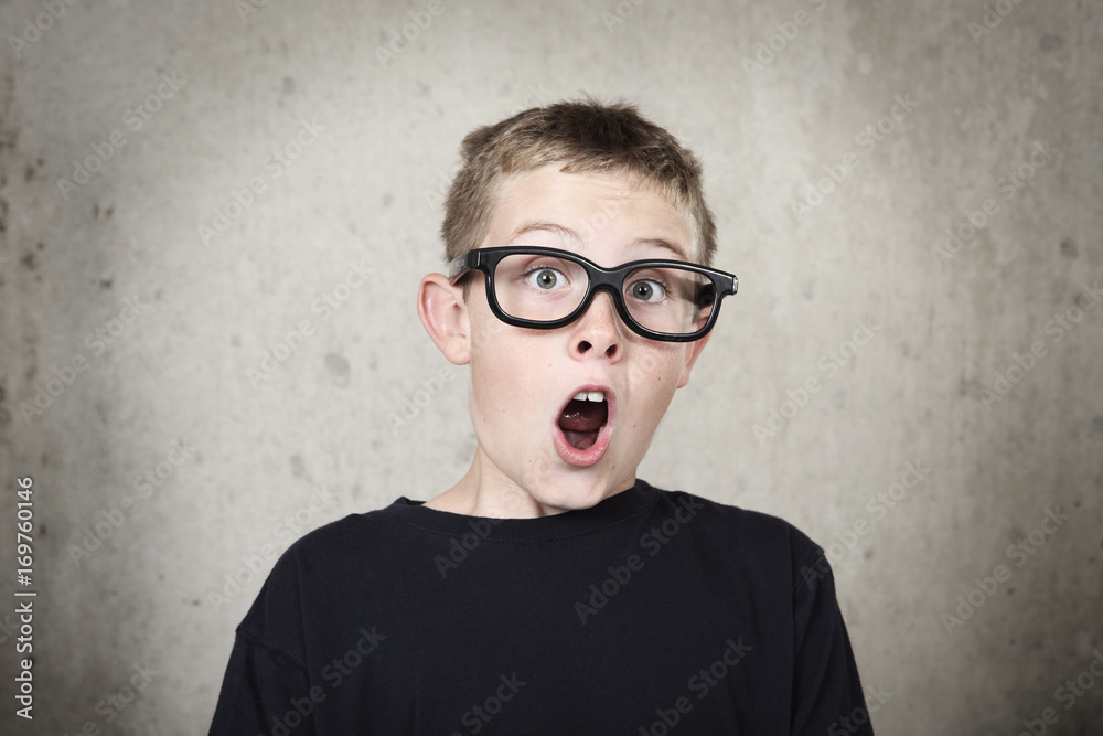 Surprised boy with black glasses Surprised boy with black glasses