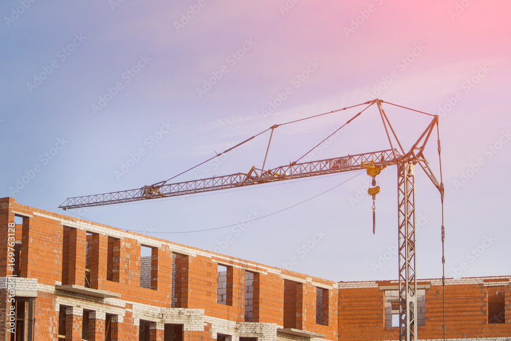 Building a house of red brick, toned