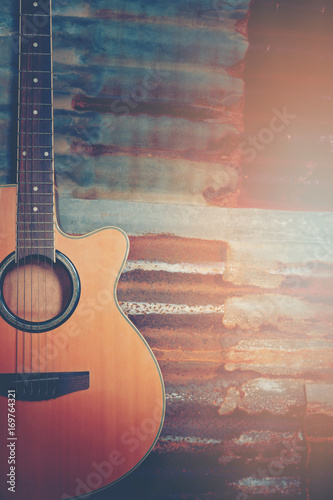 acoustic guitar on old steel background