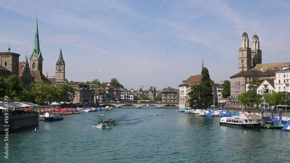 Historical part of Zurich with famous Fraumunster and Grossmunster churches in a beautiful summer day, Switzerland Historical part of Zurich with famous Fraumunster and Grossmunster churches in a beautiful summer day, Switzerland