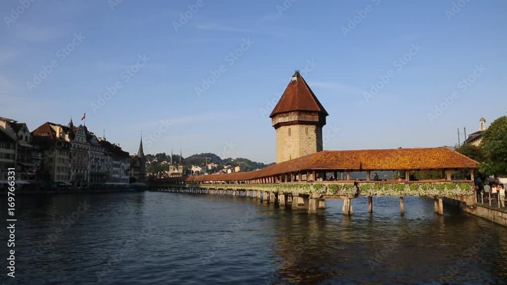 Famous Chapel bridge in Lucerne in a beautiful summer day, Switzerland Famous Chapel bridge in Lucerne in a beautiful summer day, Switzerland