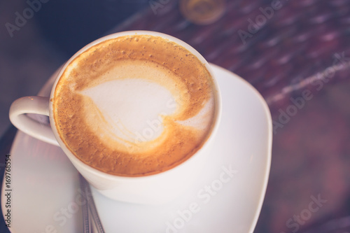 a cup of Capuchino coffee
