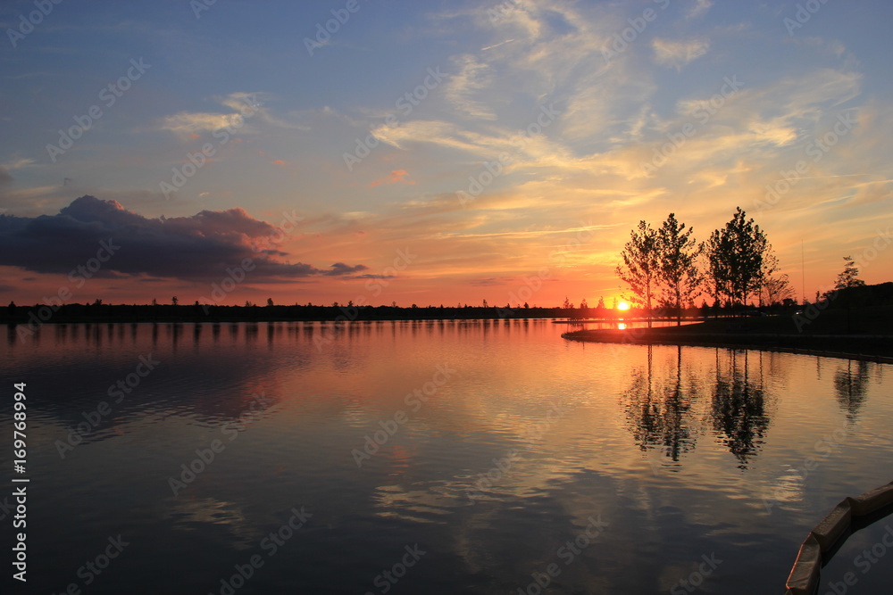 Peaceful sunset view on the lake at shelby farms