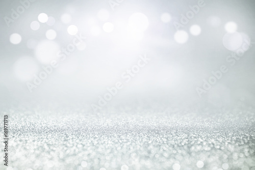 blue and silver glitter lights bokeh abstract background holiday. defocused. © oatawa