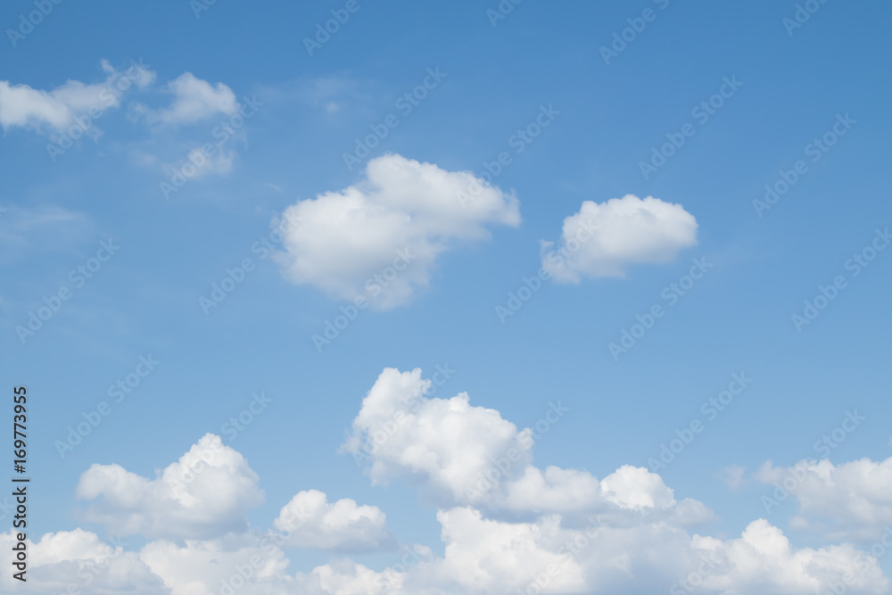 White fluffy clouds on a blue sky, wallpaper White fluffy clouds on a blue sky, wallpaper