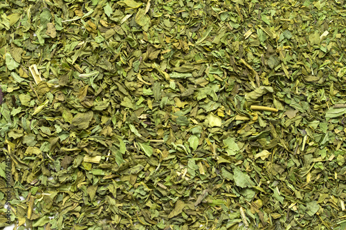 Dried shredded green leaves tea, mint, tobacco