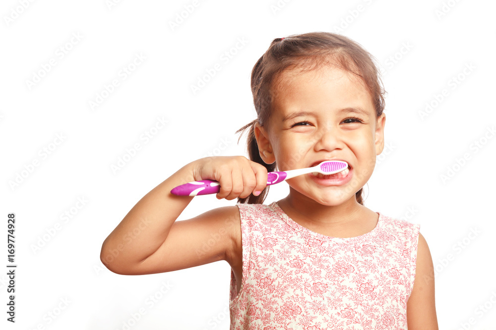 Child girl brushing teeth on white background. Child girl brushing teeth on white background.