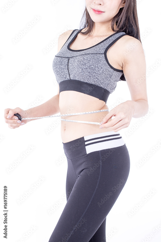 Asian Woman measuring her hips, sport woman concept, isolated with white background. Asian Woman measuring her hips, sport woman concept, isolated with white background.