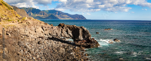 Panorama coastal landscape and seascape of Kaena Point National Park on Oahu, Hawaii north shore with rocky arch. / Kaena Point Panorama Landscape