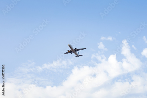 Airplane in the blue sky