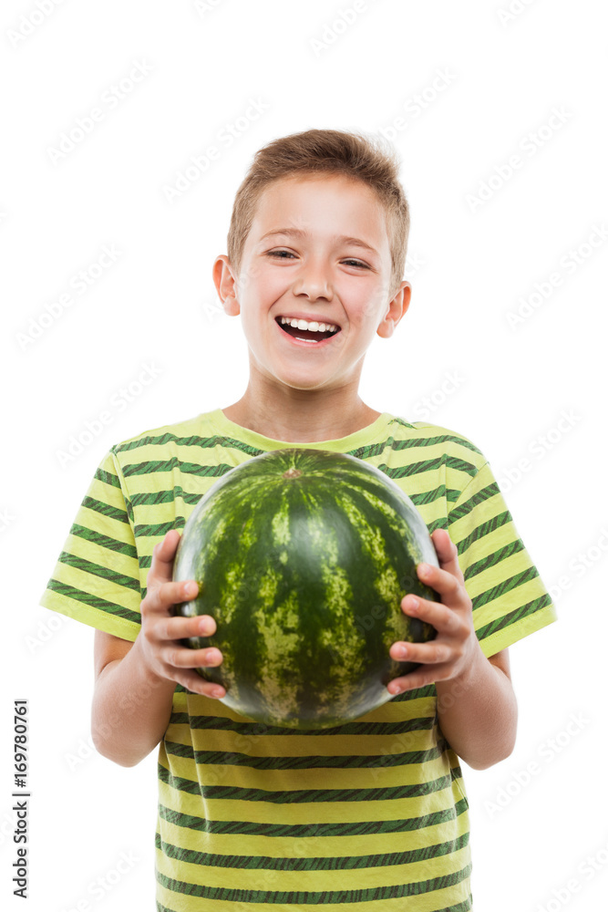 Handsome smiling child boy holding green watermelon fruit Handsome smiling child boy holding green watermelon fruit