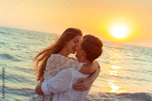 Romantic couple kissing on the beach © fotofabrika