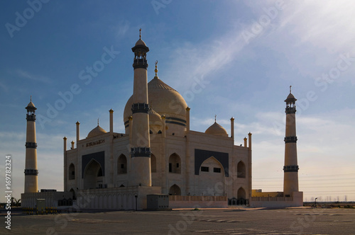 Exterior view to Friendly Fatima Zahra mosque aka copy of Taj Mahal in Kuwait photo