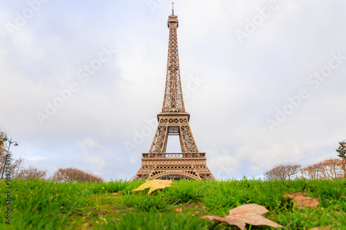 PARIS, FRANCE - DECEMBER 11, 2014: Aerial view of Eiffel Tower with maple leaves amoung Avenue Anatole France & Avenue Pierre Loti most visited monument in France and the most famous symbol of Paris