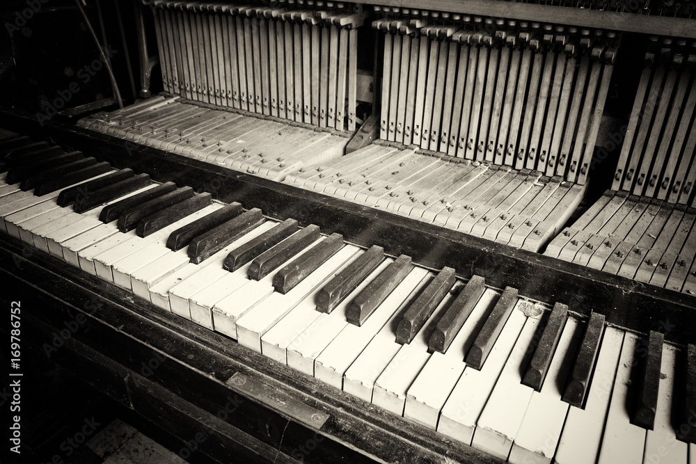 Keys from an old broken damaged piano Keys from an old broken damaged piano