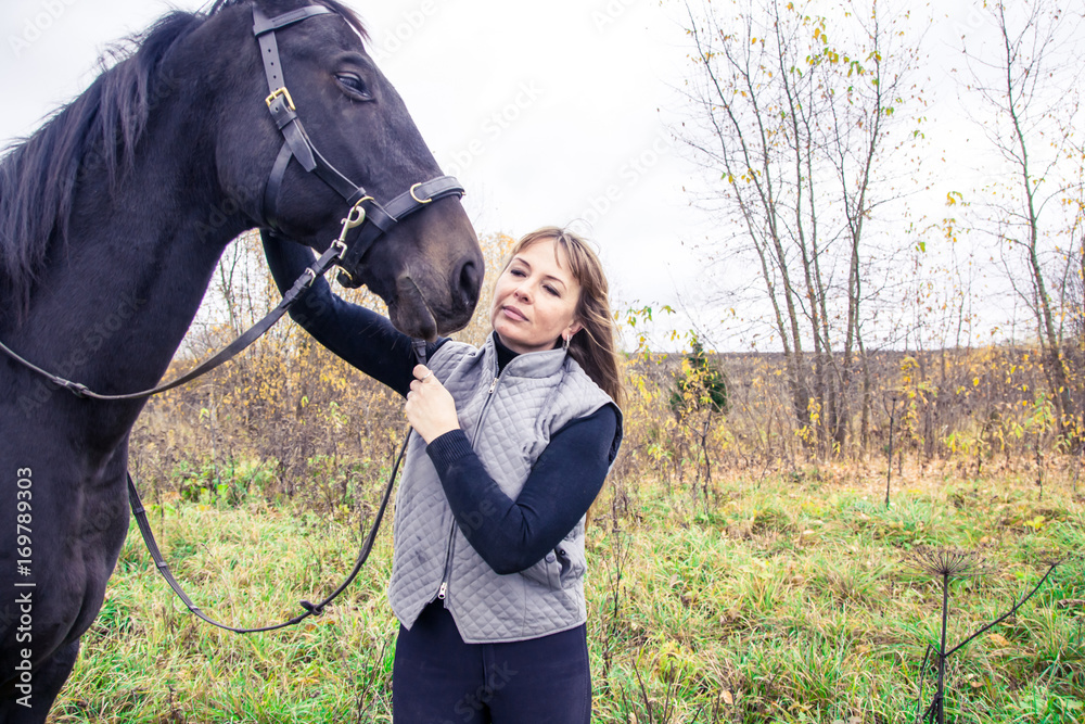 Obraz premium Girl and horse