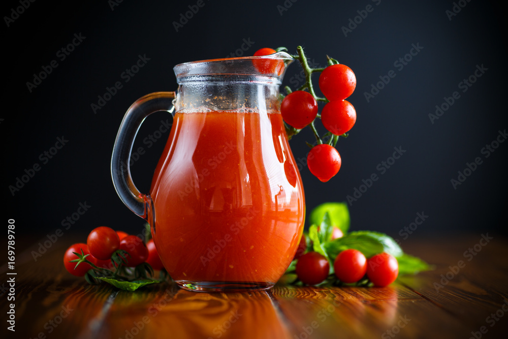Homemade natural tomato juice in a decanter Homemade natural tomato juice in a decanter