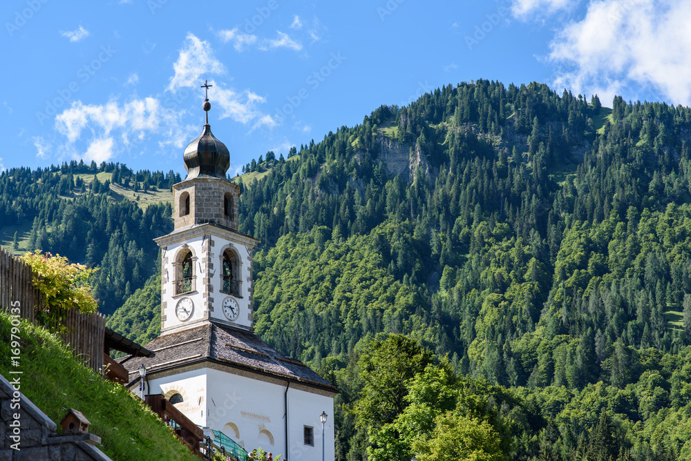 Typical Houses and churches of the mountain village of Sauris