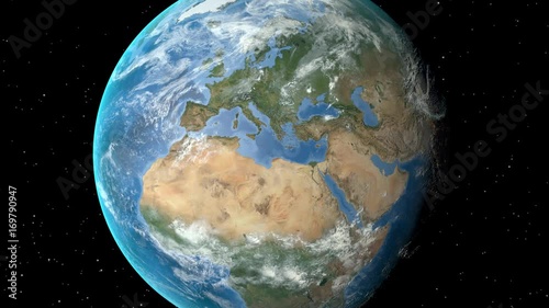 Night to day - rotating Earth. Zoom in on France outlined
