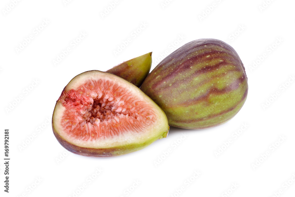 whole and half cut ripe fig on white background