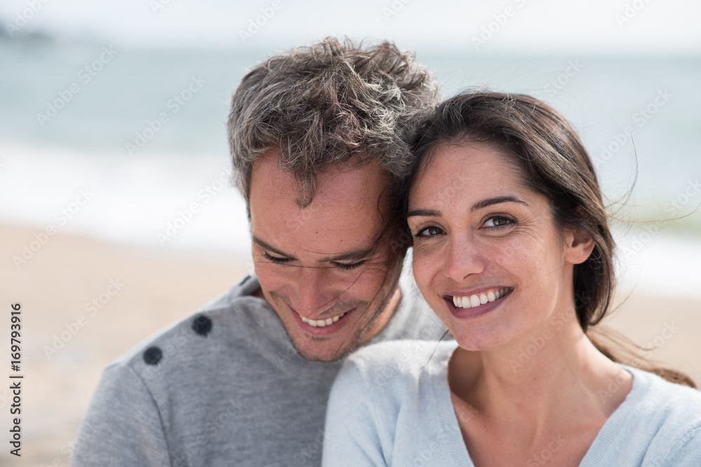 Portrait of a middle-aged couple having fun on the beach Portrait of a middle-aged couple having fun on the beach