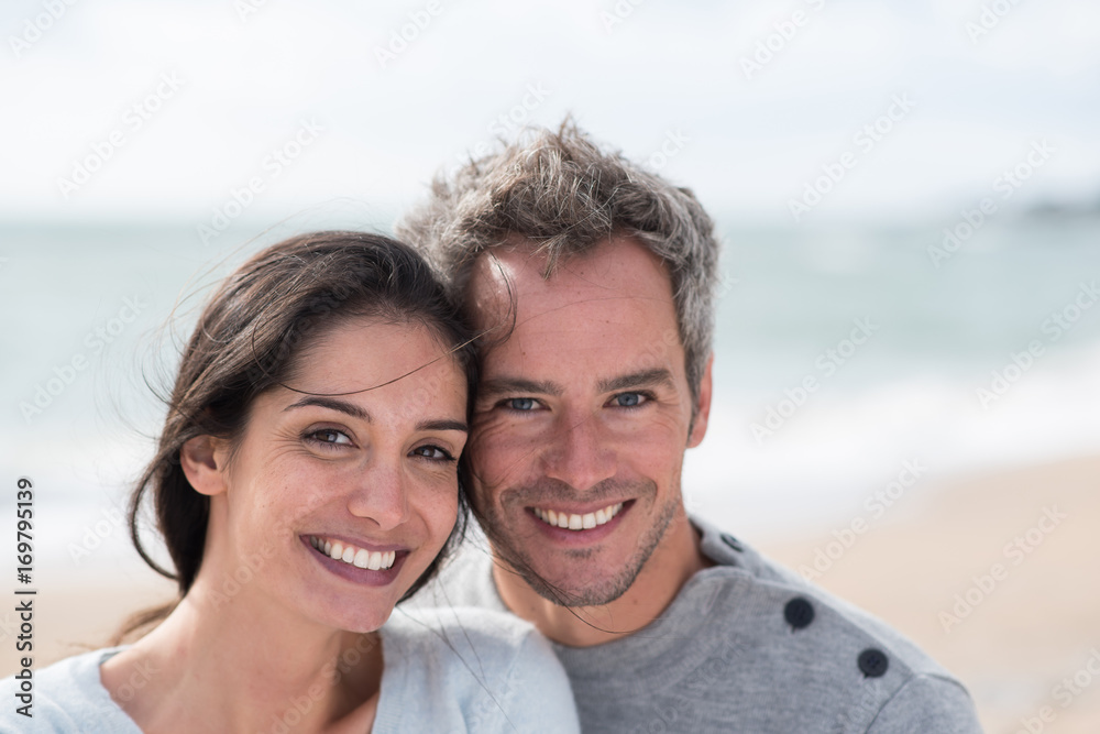 Portrait of a middle-aged couple having fun on the beach Portrait of a middle-aged couple having fun on the beach