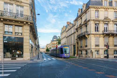Tram on the streets and Architecture of Reims a city in the Champagne-Ardenne region of France. © Southtownboy Studio