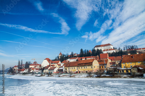 Frozen Drava river at town of Ptuj, Slovenia.