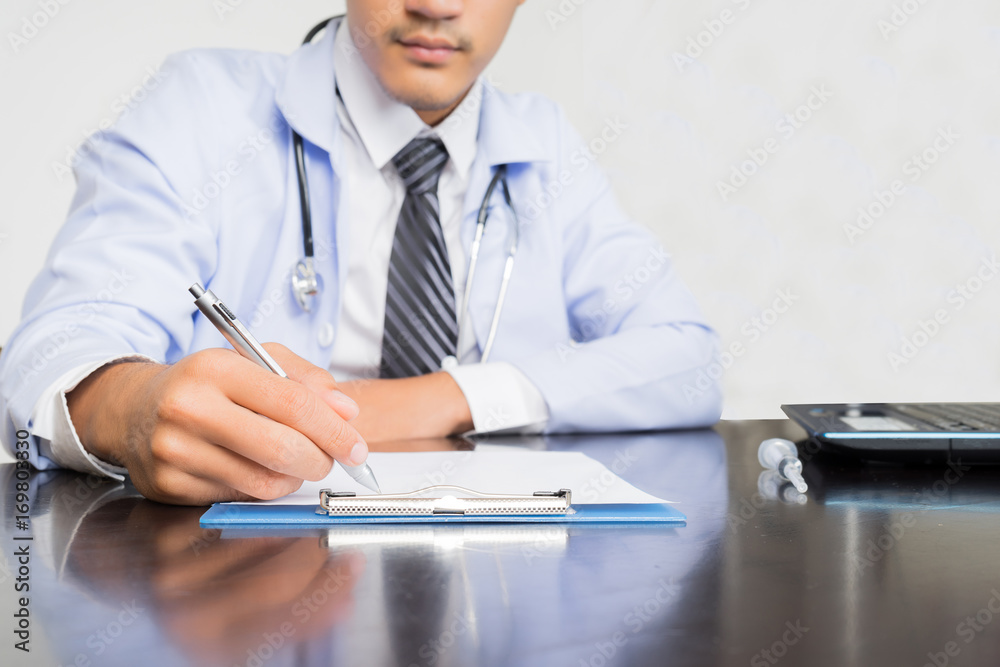 medical doctor working with laptop computer on white background medical doctor working with laptop computer on white background