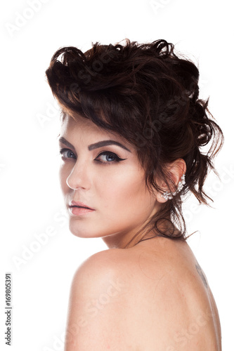 Beautiful gorgeous brunette model in studio photo isolated over white background. Perfect make up and hairstyle