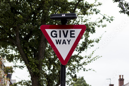 Give way sign on post photo