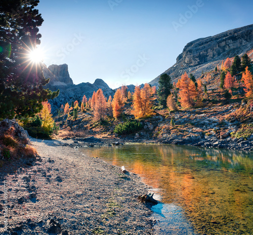 Splendid view of Limides Lake. Colorful autumn morning in Dolomite Alps, Falzarego pass, Cortina d'Ampezzo lacattion, Italy, Europe. Artistic style post processed photo. photo