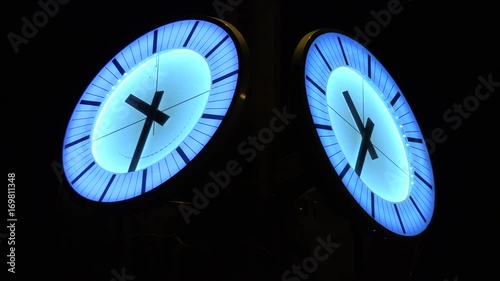 Closeup on the clock tower at night photo