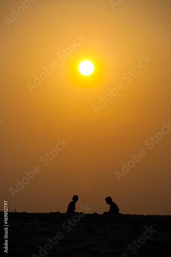 Two People Silhouette Beach Orange Sunset Sun Sky