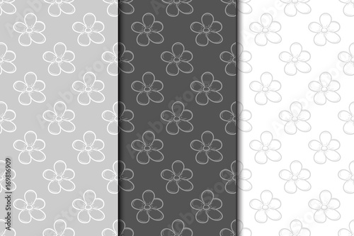 Set of floral seamless patterns. Gray backgrounds