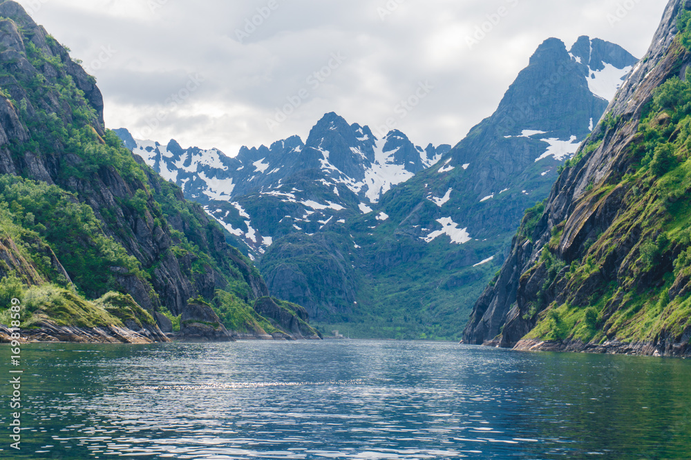 Troll fjord in Norway. Sailing yacht.