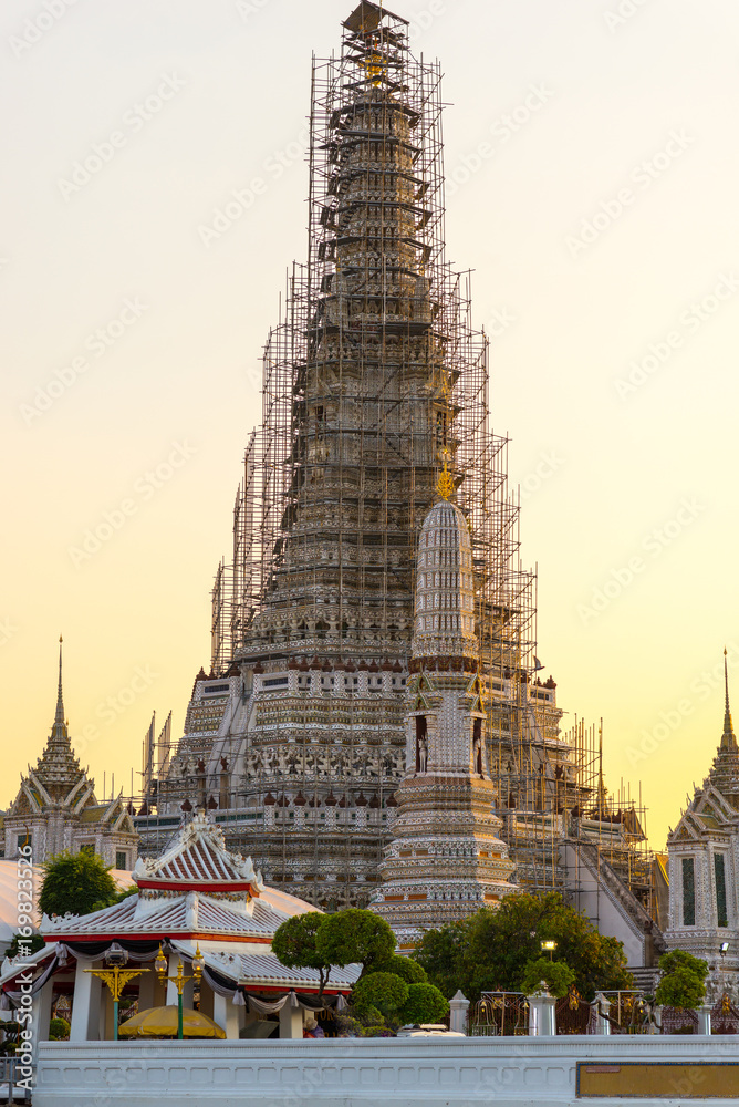Scaffold tower of the buddhist temple Wat Arun in Bangkok.  The exterior is by seashell and porcelain and the Thai name is Phra Prang. Wat Arun is among the best known of Thailands landmarks 