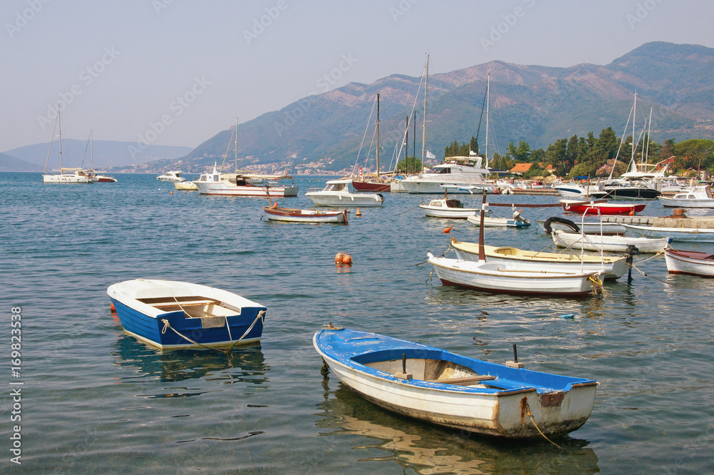 Fishing boats on the water near seaside village of Seljanovo. Bay of Kotor (Adriatic Sea), Tivat, Montenegro